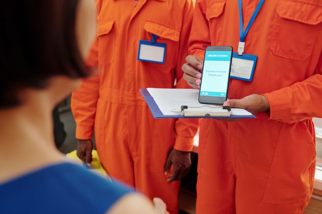 Pumbers Receiving Payment for Service